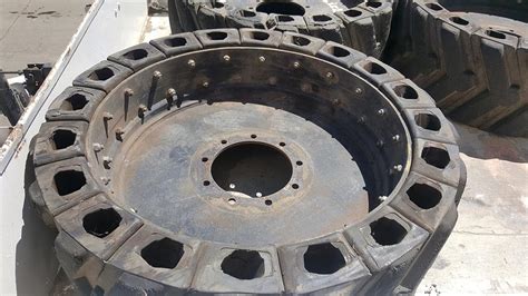 http www.usa-dealer.net 4-skid-steer-airboss-tires-and-rims _p_5487.html|air boss segmented tires review.